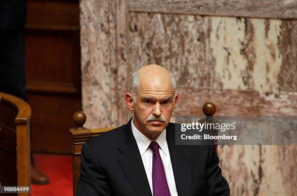 George Papandreou, Greece's prime minister, listens in the Greek parliament in Athens, Greece, on Thursday, May 6, 2010. Greece's Parliament began...