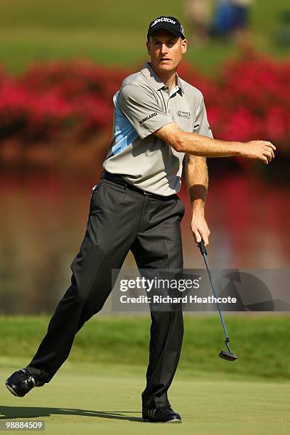 Jim Furyk reacts to a putt on the 16th green during the first round of THE PLAYERS Championship held at THE PLAYERS Stadium course at TPC Sawgrass on...