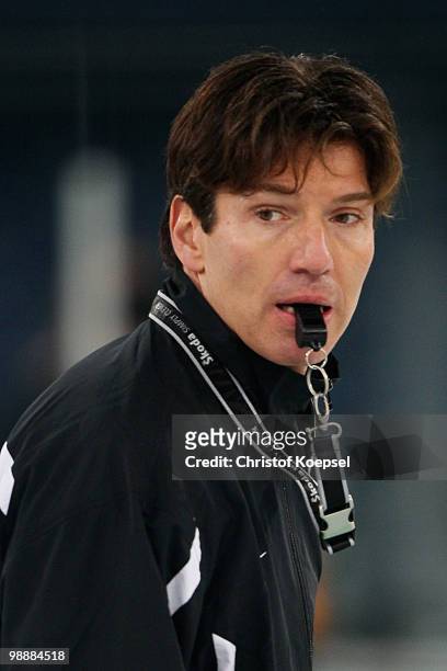 National coach Uwe Krupp of Germany looks on during a training session at the Veltins Arena ahead of the IIHF World Championship on May 6, 2010 in...