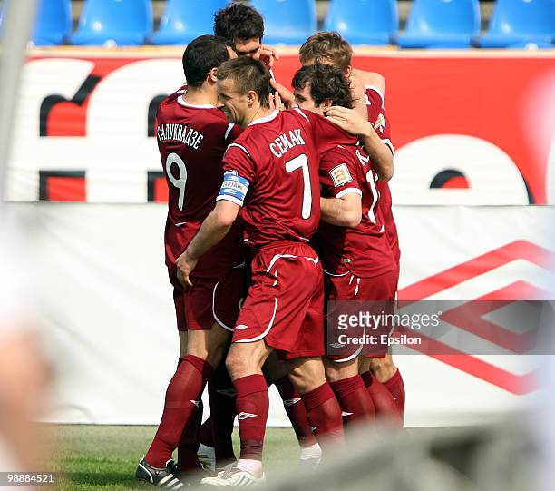 Players of FC Rubin Kazan celebrate after scoring a goal during the Russian Football League Championship match between FC Rubin Kazan and FC Sibir...
