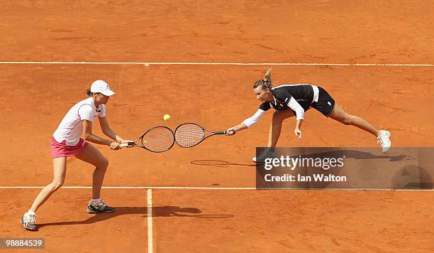 Kveta Peschke of the Czech Republic and Katarina Srebotnik of Slovakia in action against Vera Dushevina of Russia and Klaudia Jans of Poland during...