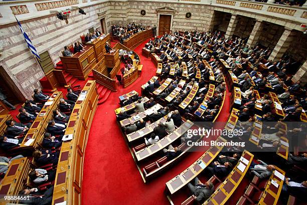George Papandreou, Greece's prime minister, center left, speaks to members of the Greek parliament in Athens, Greece, on Thursday, May 6, 2010....