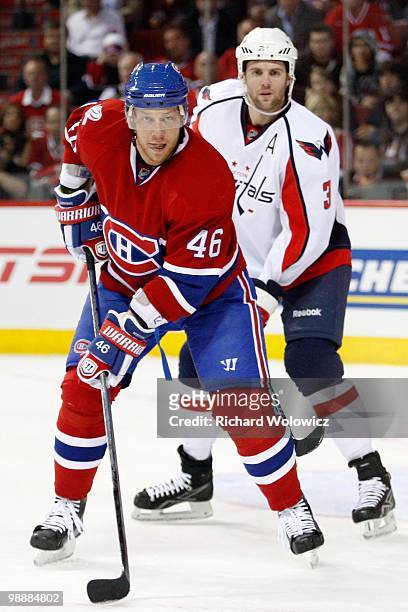 Andrei Kostitsyn of the Montreal Canadiens watches play in Game Six of the Eastern Conference Quarterfinals against the Washington Capitals during...
