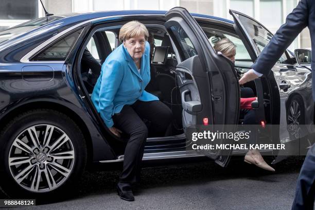 German Chancellor Angela Merkel arrives outside the German public television ZDF to give the traditional "summer interview" on July 1, 2018 in...