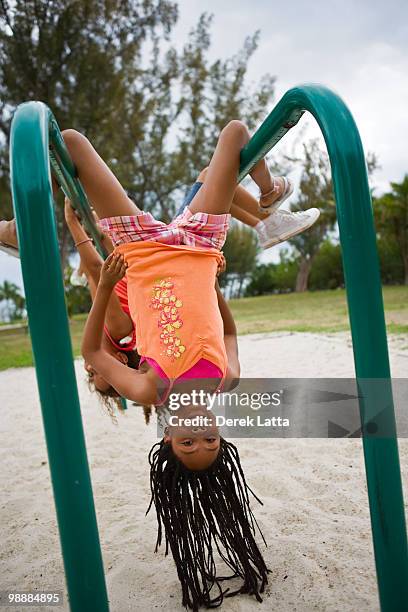 upside-down girl - derek latta stock-fotos und bilder