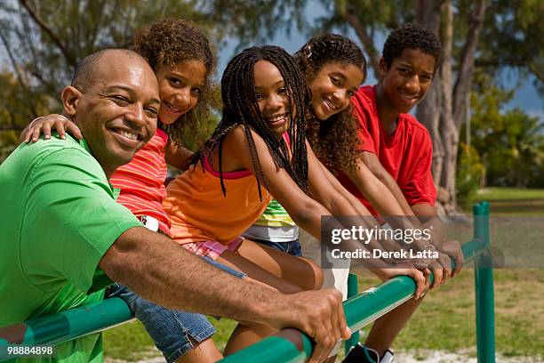 family in the park - derek latta stock pictures, royalty-free photos & images