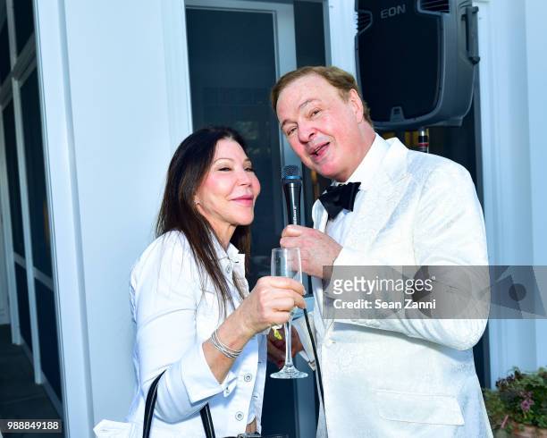 Jane Scher and Alex Donner sing at Jean And Martin Shafiroff Host Cocktails For Stony Brook Southampton Hospital on June 30, 2018 in Southampton, New...