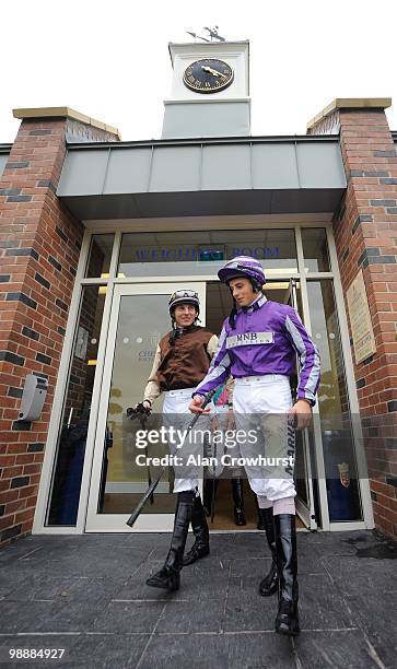 Jockey's William Buick and Eddie Ahern leave the weighing room at Chester racecourse on May 06, 2010 in Chester, England