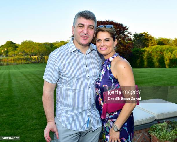 Apostolos Tassiopoulos and Yianna Tassiopoulos attend Jean And Martin Shafiroff Host Cocktails For Stony Brook Southampton Hospital on June 30, 2018...