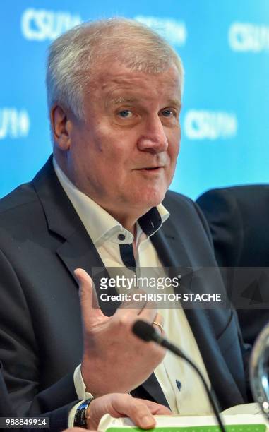 German Interior Minister and Bavarian Christian Social Union politician Horst Seehofer gestures at the beginning of a party leadership meeting of the...
