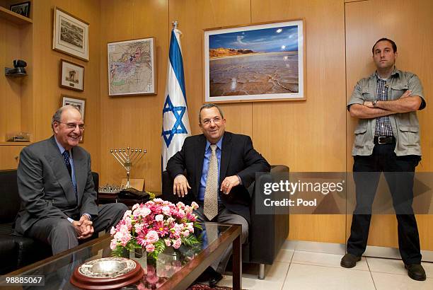 Israeli Defense Minister Ehud Barak receives U.S. Mideast envoy George Mitchell during their meeting on May 2010 in Tel Aviv, Israel. The Palestinian...