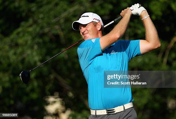 Greg Owen of England hits his tee shot on the fifth hole during the first round of THE PLAYERS Championship held at THE PLAYERS Stadium course at TPC...