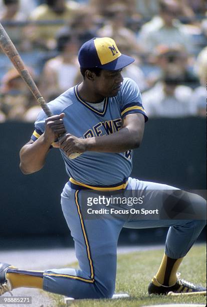Outfielder Hank Aaron Of the Milwaukee Brewers on one knee swinging a bat in the on deck circle circa 1975 during a Major League Baseball game. Aaron...