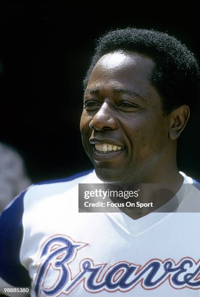 Outfielder Hank Aaron of the Atlanta Braves smilling in this portrait circa 1974 before a Major League Baseball game at Atlanta-Fulton County Stadium...