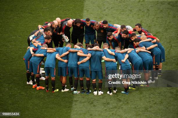 Spain players form a huddle during warm up prior to the 2018 FIFA World Cup Russia Round of 16 match between Spain and Russia at Luzhniki Stadium on...