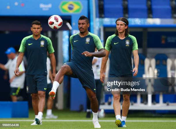 Thiago Silva, Paulinho and Filipe Luis in action during a Brazil training session ahead of the Round 16 match against Mexico at Samara Arena on July...