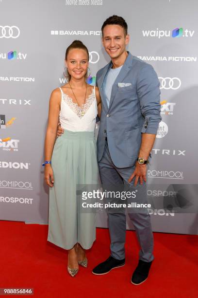 June 2018, Munich, Germany: Actress Sonja Gerhardt and actor Vladimir Burlakov , attend the the double event "Audi Directors Cut" and "Movie meets...