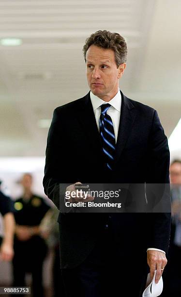Timothy Geithner, U.S. Treasury secretary, walks to a hearing of the Federal Inquiry Crisis Commission in Washington, D.C., U.S., on Thursday, May 6,...