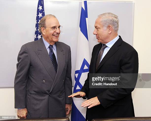 In this handout image provided by U.S. Embassy Tel Aviv Israeli Prime Minister Benjamin Netanyahu receives U.S. Mideast envoy George Mitchell during...