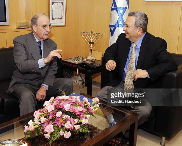 In this handout image from U.S. Embassy Tel Aviv, Israeli Defense Minister Ehud Barak receives U.S. Mideast envoy George Mitchell during their...