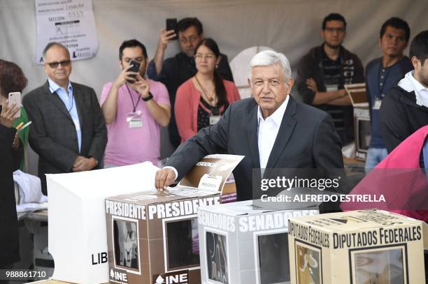 Mexico's presidential candidate Andres Manuel Lopez Obrador for the "Juntos haremos historia" party, casts his vote during general elections, in...