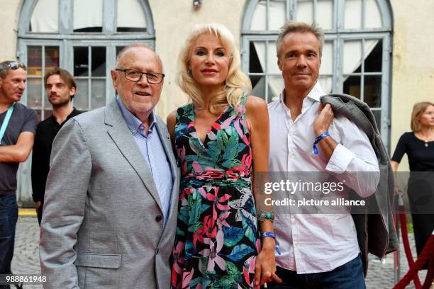 June 2018, Munich, Germany: Director Joseph Vilsmeier , his partner Birgit Muth and actor Hannes Jaenicke, attend the the double event "Audi...