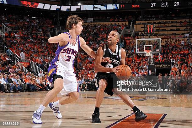 Tony Parker of the San Antonio Spurs handles the ball against Goran Dragic of the Phoenix Suns in Game One of the Western Conference Semifinals...