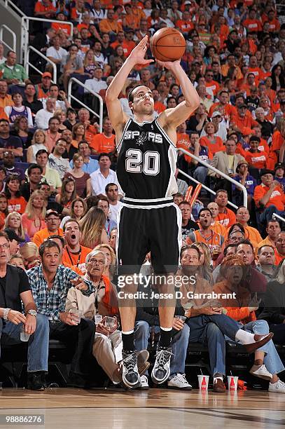 Manu Ginobili of the San Antonio Spurs shoots against the Phoenix Suns in Game One of the Western Conference Semifinals during the 2010 NBA Playoffs...
