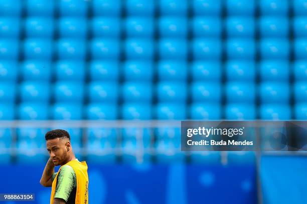 Neymar looks on during a Brazil training session ahead of the Round 16 match against Mexico at Samara Arena on July 1, 2018 in Samara, Russia.