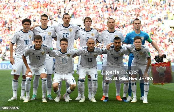 The Russia team line up ahead of the 2018 FIFA World Cup Russia Round of 16 match between Spain and Russia at Luzhniki Stadium on July 1, 2018 in...