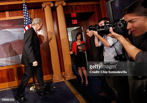 Senate Homeland Security and Governmental Affairs Committee Chairman Joe Lieberman walks off the stage after a news briefing about his proposed...