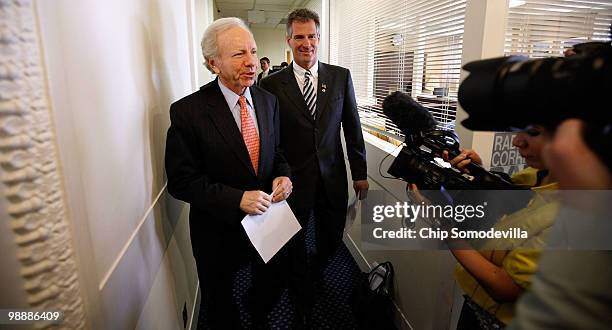 Senate Homeland Security and Governmental Affairs Committee Chairman Joe Lieberman and Sen. Scott Brown arrive for a news briefing about their...