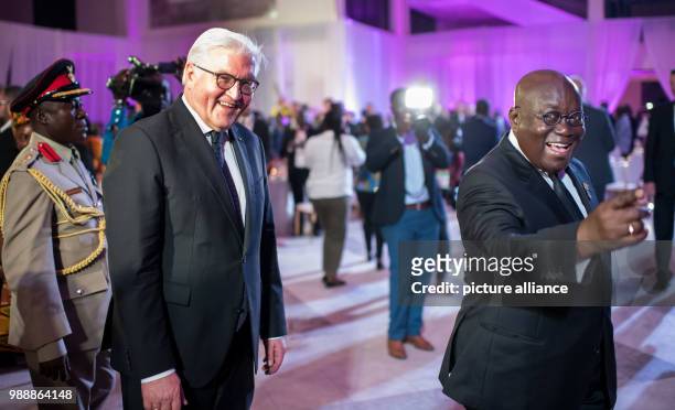 German President Frank-Walter Steinmeier and the President of Ghana Nana Akufo-Addo arrive at the state banquet in honour of the German President in...