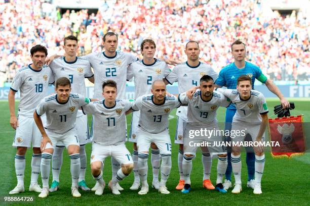 Russia's midfielder Yury Zhirkov, Russia's defender Ilja Kutepov, Russia's forward Artem Dzyuba, Russia's defender Mario Fernandes, Russia's defender...