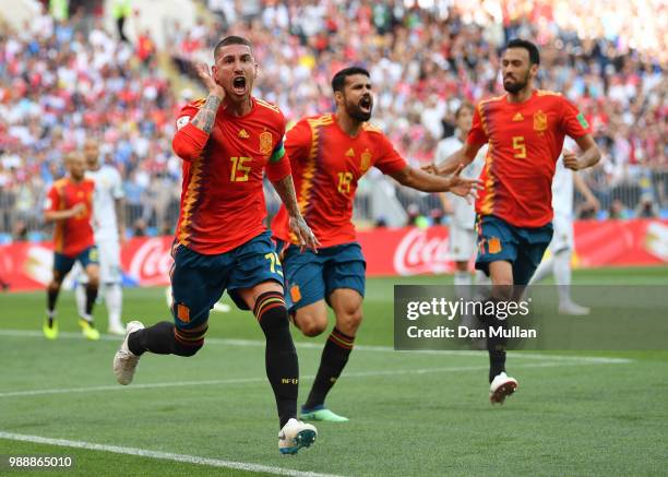 Sergio Ramos of Spain celebrates after Sergey Ignashevich of Russia scores an own goal for Spain's first goal during the 2018 FIFA World Cup Russia...