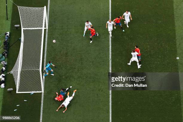 Sergey Ignashevich of Russia scores an own goal to put Spain in front 1-0 during the 2018 FIFA World Cup Russia Round of 16 match between Spain and...