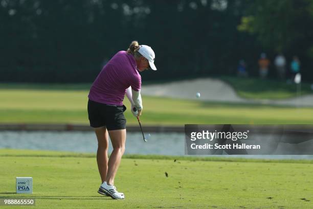 Stacy Lewis hits her tee shot on the third hole during the final round of the KPMG Women's PGA Championship at Kemper Lakes Golf Club on July 1, 2018...