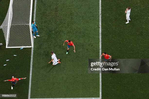 Sergio Ramos of Spain celebrates after Sergey Ignashevich of Russia scores an own goal for Spain's first goal during the 2018 FIFA World Cup Russia...