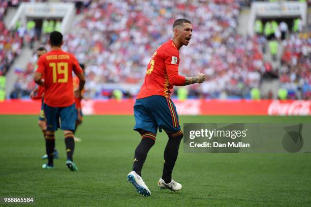 Sergio Ramos of Spain celebrates after Sergey Ignashevich of Russia scores an own goal for Spain's first goal during the 2018 FIFA World Cup Russia...