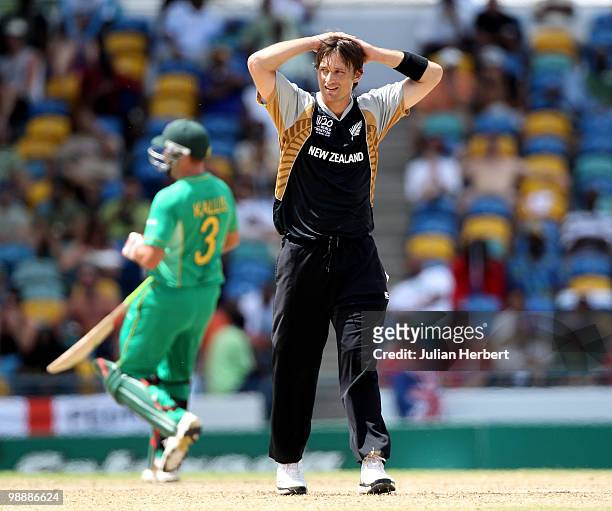 Shane Bond of New Zealand looks despondent as runs are scored of his bowling during The ICC World Twenty20 Super Eight match between South Africa and...