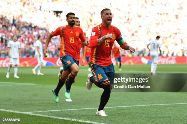 Sergio Ramos of Spain celebrates after Sergey Ignashevich of Russia scores an own goal for Spain's first goal during the 2018 FIFA World Cup Russia...