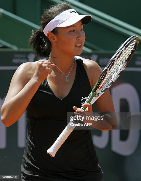 Shuai Peng of China reacts during their Estoril Open tennis match against Anabel Garrigues of Spain at Jamor Stadium, in Estoril, outskirts of...