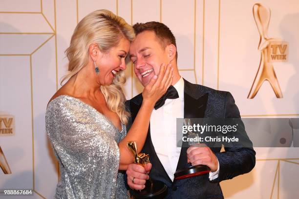 Grant Denyer celebrates with wife Chezzi after winning the Gold Logie at the 60th Annual Logie Awards at The Star Gold Coast on July 1, 2018 in Gold...