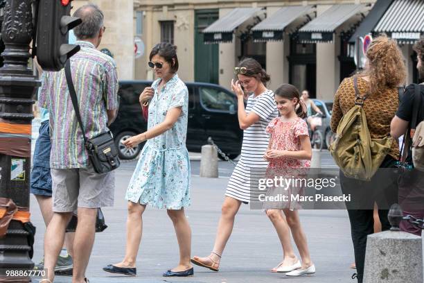 Actress Katie Holmes and daughter Suri Cruise are seen on Place du Palais Royal on July 1, 2018 in Paris, France.