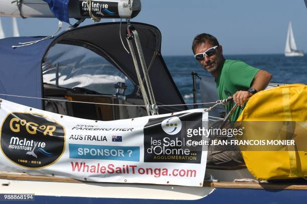 English born-Australian Kevin Farebrother skipper sails his boat "Sagarmatha" as he sets sail from Les Sables d'Olonne Harbour on July 1 at the start...