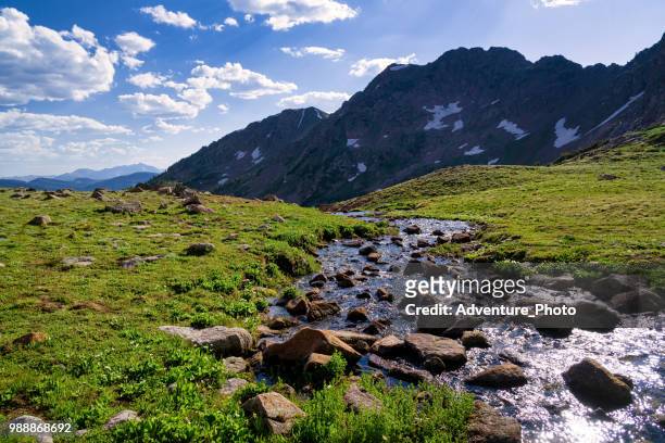 alpine lake outlet vail colorado gore range mountains unicornia - vail colorado stock pictures, royalty-free photos & images