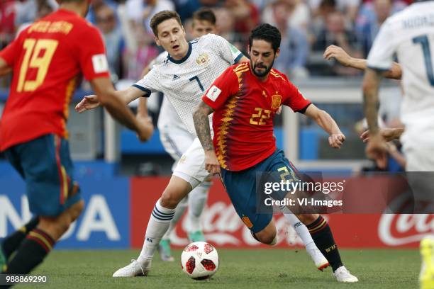 Daler Kuzyaev of Russia, Isco of Spain during the 2018 FIFA World Cup Russia round of 16 match between Spain and Russia at the Luzhniki Stadium on...