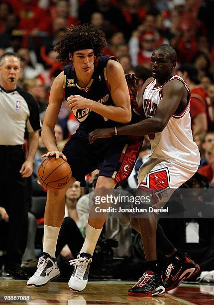 Anderson Varejao of the Cleveland Cavaliers moves against Luol Deng of the Chicago Bulls in Game Three of the Eastern Conference Quarterfinals during...
