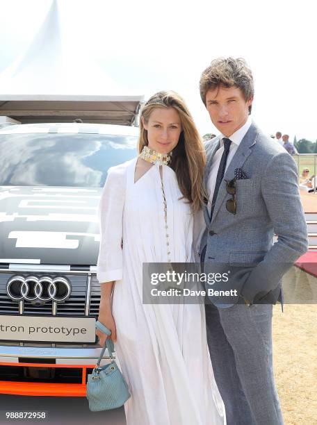 Hannah Redmayne and Eddie Redmayne attend the Audi Polo Challenge at Coworth Park Polo Club on July 1, 2018 in Ascot, England.