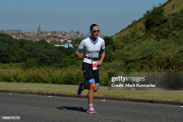 Nikki Bartlett of Great Britain competes in the run leg inside Holyrood Park during the IRONMAN 70.3 Edinburgh Triathlon on July 1, 2018 in...